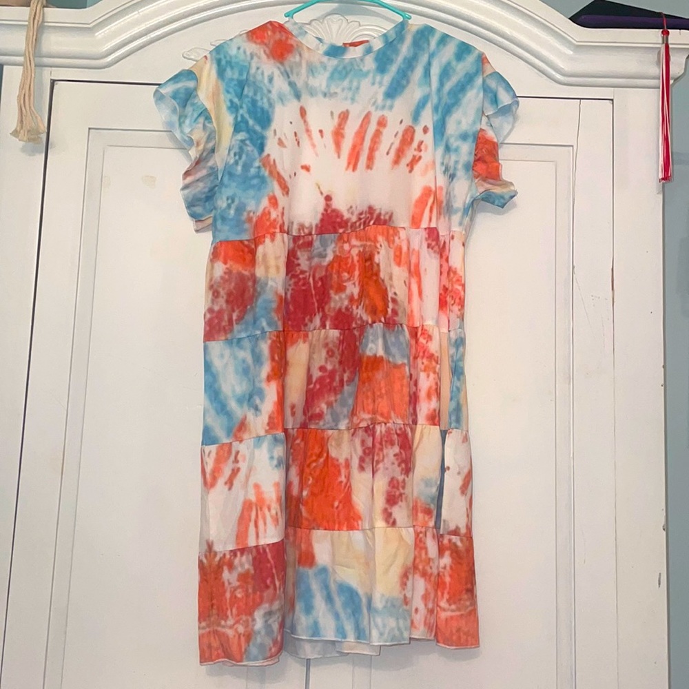 Tie Dye dress that hits above the knees on me.